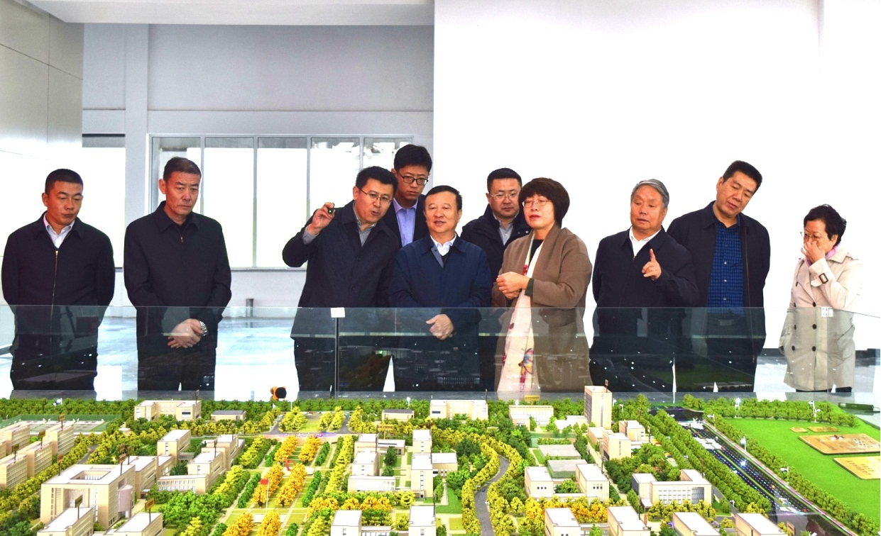 ������ίͳս�����񸱲����Ž���һ����ɽ����Ͷ�н�����Ŀʵ�ع�Ħ